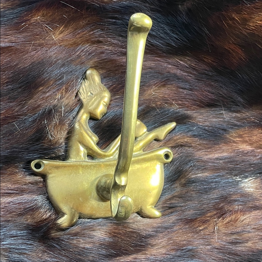 Brass wall hook woman bathing
